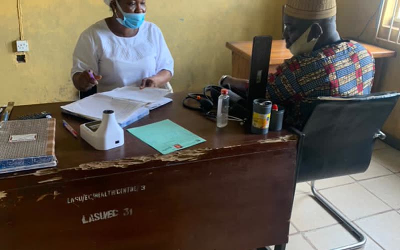 Nurse attending to a patient in a clinic